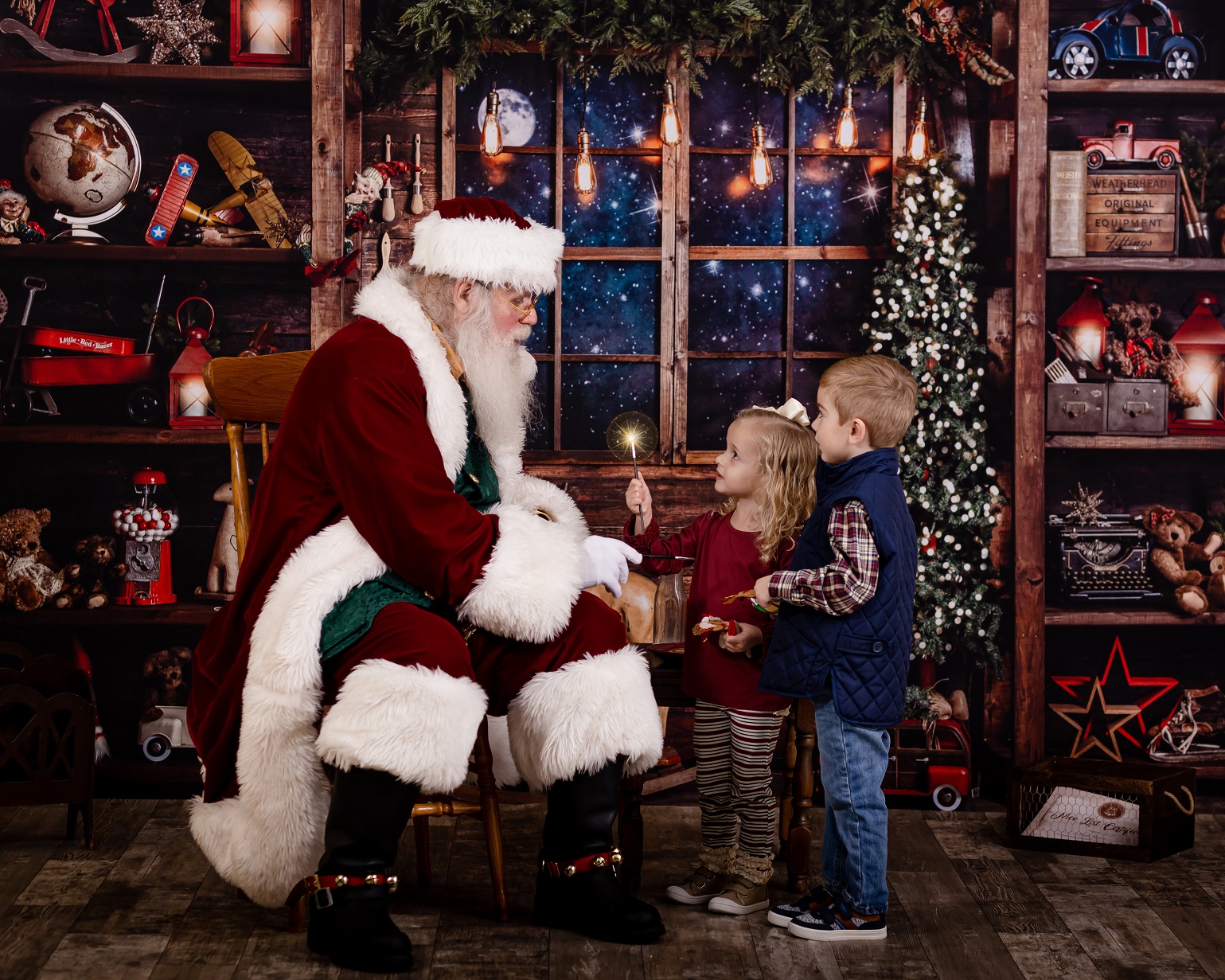 two siblings with santa claus